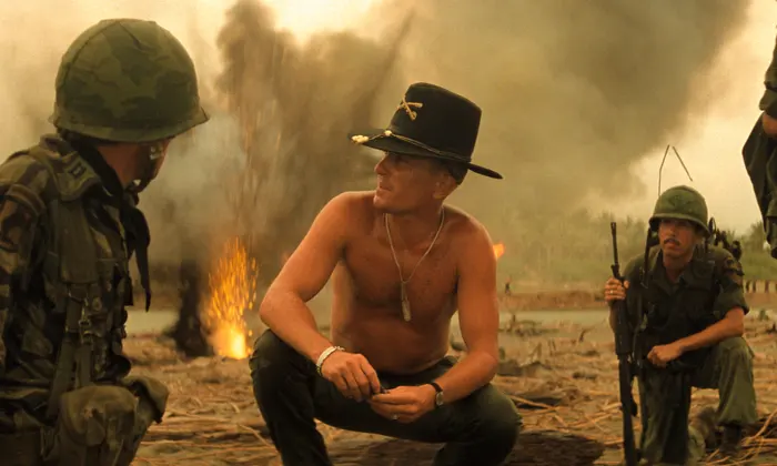 Colonel gives orders to men on beach in Vietnam Apocalypse Now