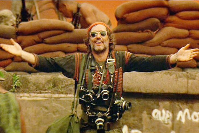 Dennis Hopper in Apocalypse Now with his arms extended welcoming you