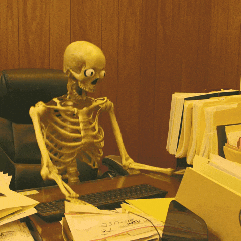 A skeleton typing furiously