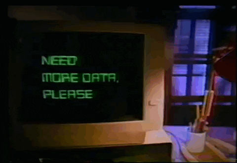 An old style computer screen with the words 'Need more data please' on it.