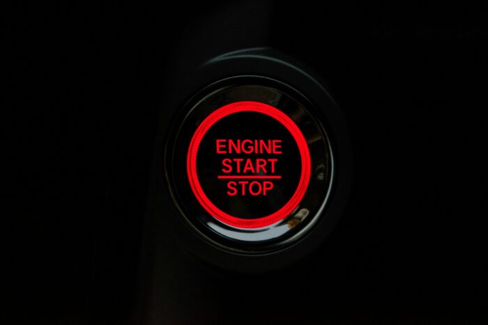 Engine start stop button